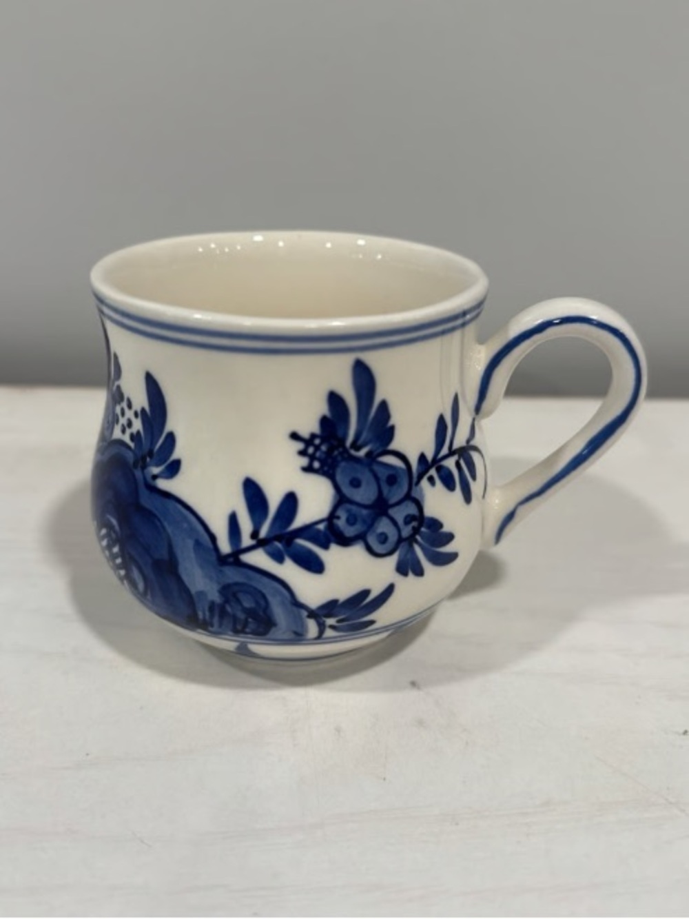 Blue Floral Ceramic Mug with White Base